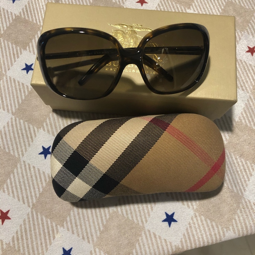 Gently used Burberry 4068 sunglasses.